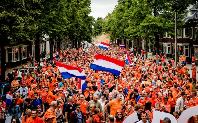 Image of kingsday in the Netherlands. What people think the Netherlands look like.